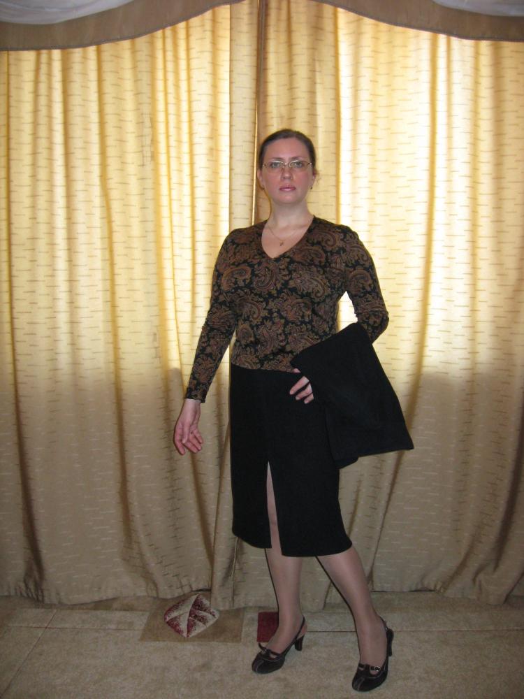 Блузка из шерстяного трикотажа.