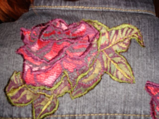 Вышивка вискозным шелком по аппликации