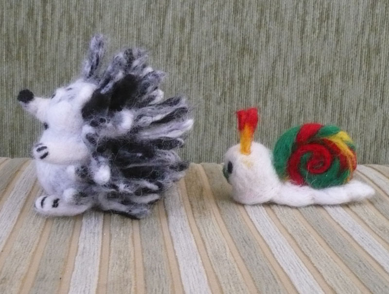 Еж с улиткой