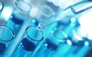 depositphotos_146185457_stock_photo_pipette_dropping_sample_into_test.jpg